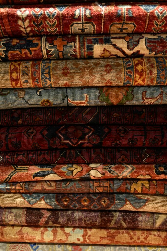 Stacked rugs in our shop